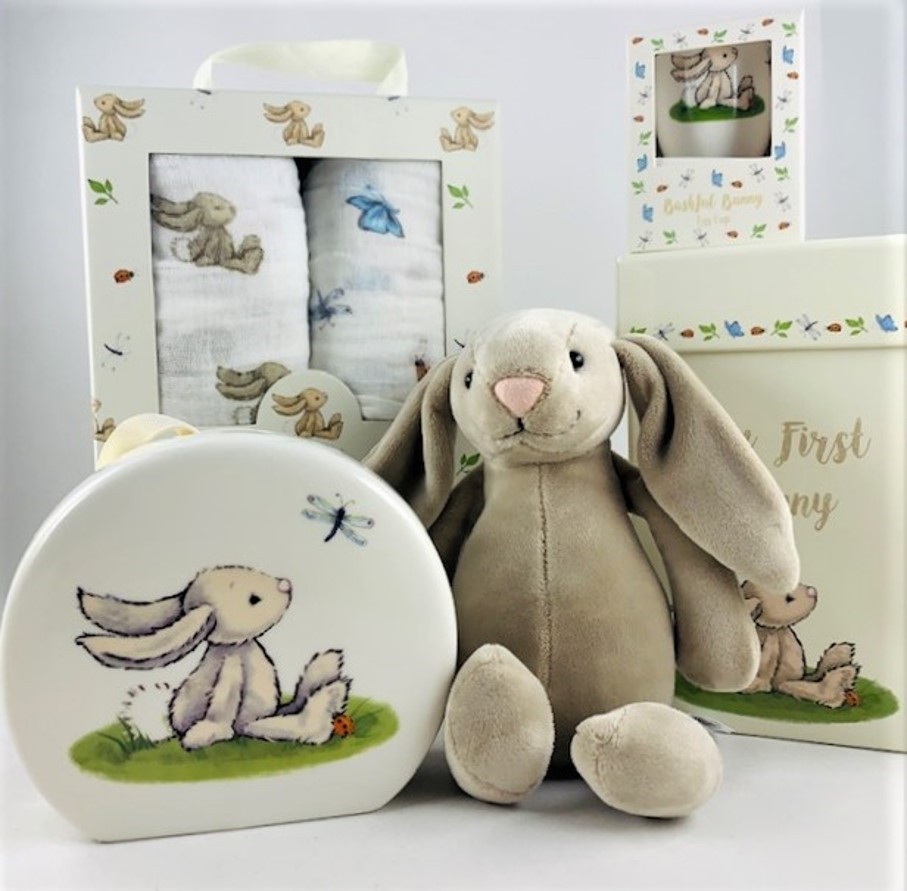 New Baby. A selection of rabbit themed baby gifts including a soft toy rabbit.